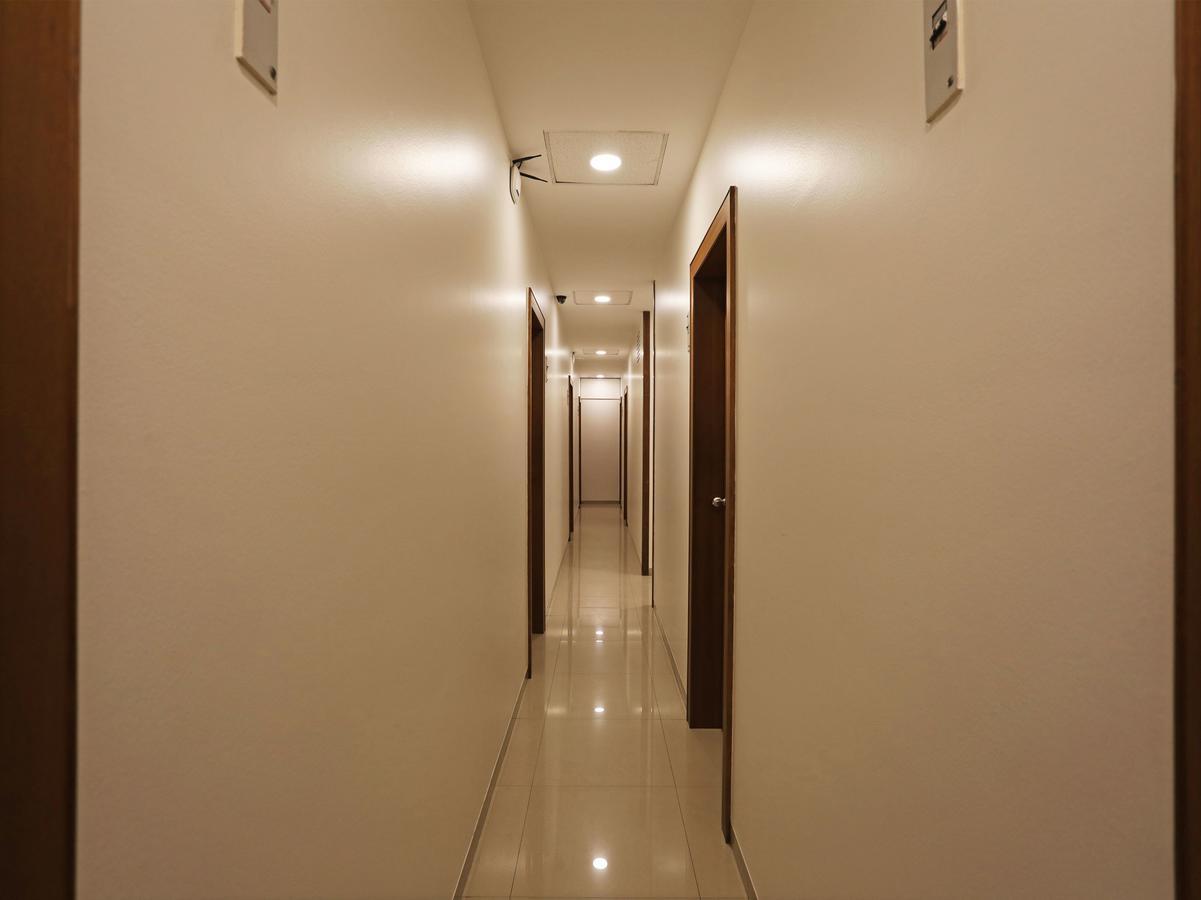 Oyo 1194 Hotel Gulmohr Poona Buitenkant foto